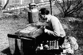 Martin Lindauer working at a bench in a field